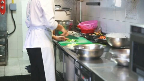 Chef preparing cooking food in kitchen Stock Footage 91089193