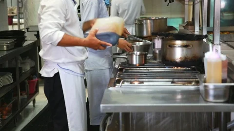 Chef preparing cooking food in kitchen Stock Footage 91089363