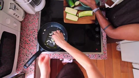 Chef preparing delicious courgette in kitchen at home - 15 sec Stock Footage 134650521