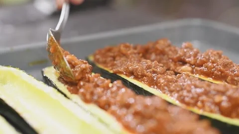 Chef preparing delicious stuffed zucchini. Stock Footage 154940119