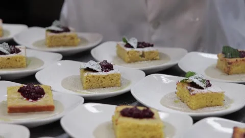 Chef preparing a dessert for a dinner in the kitchen Stock Footage 317602330