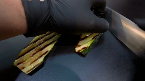 Chef preparing a dish with fresh various vegetables - detail shot Stock Footage 82605586