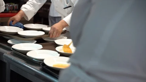 Chef preparing a dish in the restaurant kitchen. Stock Footage 108523619