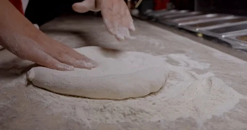 Chef preparing dough for cooking pizza in pizzeria. Stock Footage 125607400