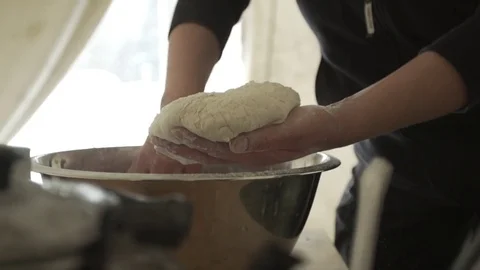 Chef preparing dough in kitchen Stock Footage 79791742
