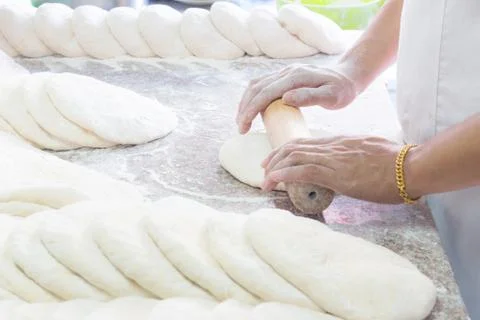 Chef preparing dough in a kitchen Stock Photos