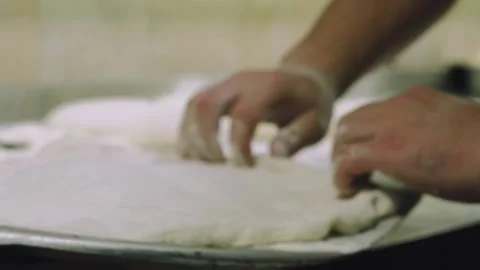 Chef preparing the dough for the pizza. Stock Footage 147704324