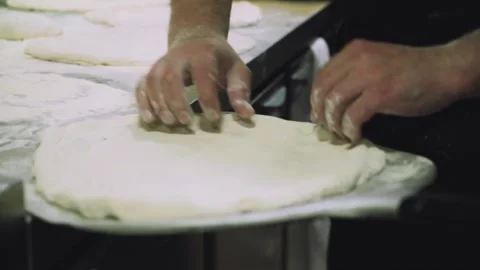 Chef preparing the dough for the pizza. Stock Footage 147704328