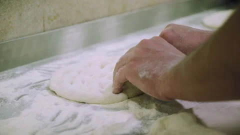 Chef preparing the dough for the pizza. Stock Footage 147704349