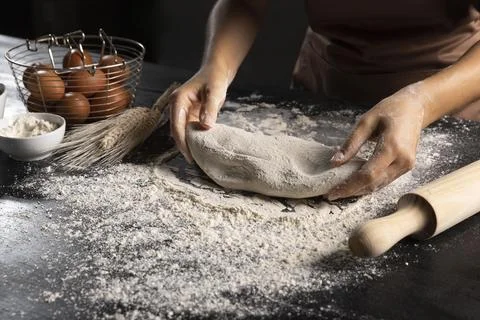 Chef preparing dough with rolling pin flour Stock Photos