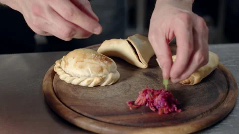 Chef preparing empanada dish Stock Footage 238640794