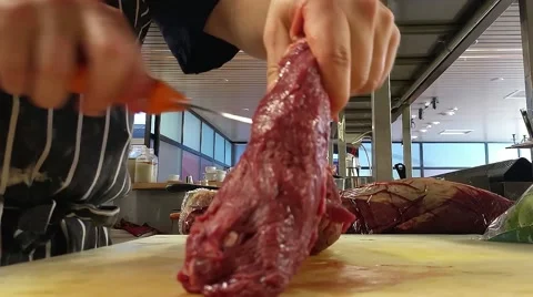 Chef preparing filet mignon meat, at a restaurant kitchen Stock Footage 54799756