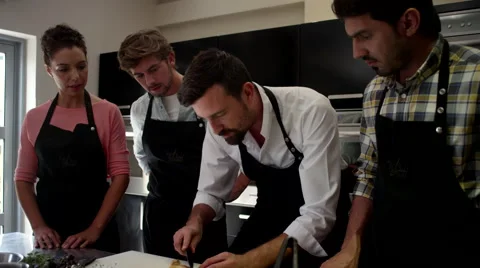 Chef preparing food at kitchen. Stock Footage 64116551