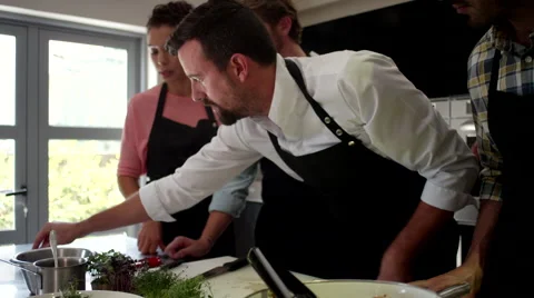 Chef preparing food at kitchen. Stock Footage 64117070