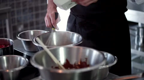 Chef preparing food at kitchen. Stock Footage