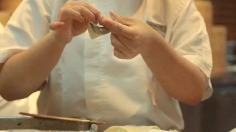 Chef preparing food in kitchen Stock Footage 64996851