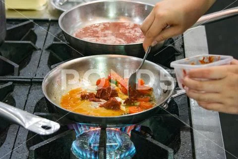 Chef preparing food, meal, in the kitchen, chef cooking, Chef decorating dish Stock Photos