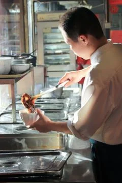 Chef preparing food Stock Photos