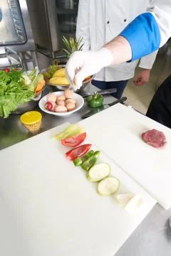 Chef preparing food Stock Photos