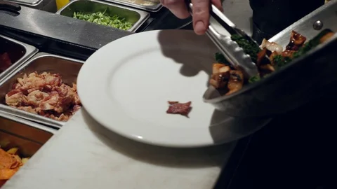 Chef Preparing Food In A Restaurant Kitchen Video stock 128927265