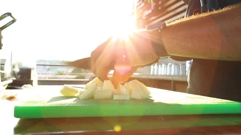 Chef preparing food with a sun flare. Видео 81228535