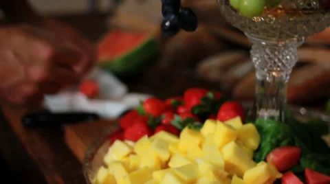 Chef preparing fresh fruit plate Stock Footage 33402223