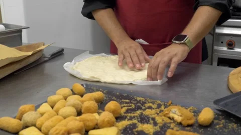 Chef preparing fresh pizza dough in professional kitchen Stock Footage 340152160