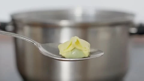 A chef preparing fresh ravioli in boiling water, showcasing delicious ravioli Stock Footage 317198926
