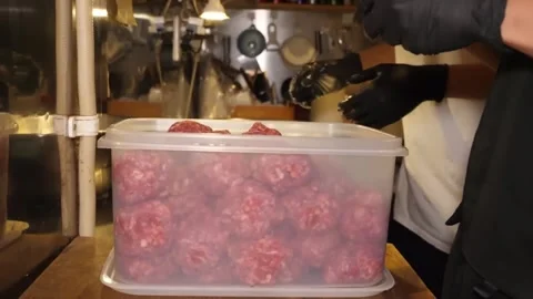 Chef Preparing Fresh Raw Beef Meatballs in Commercial Kitchen Stock-Footage 347689176