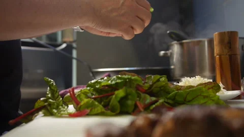 Chef Preparing Healthy Meal with Fresh Green Vegetables Stock Footage 306780220