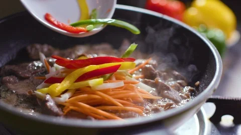 Chef is preparing a Korean dish Pulcogi, meat in Korean. Stock Footage 121744867