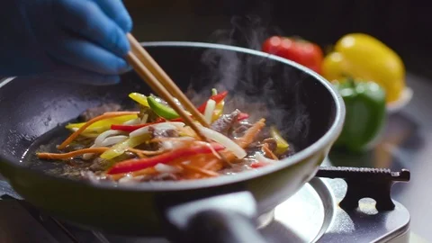 Chef is preparing a Korean dish Pulcogi, meat in Korean. Stock Footage 121744881
