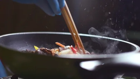 Chef is preparing a Korean dish Pulcogi, meat in Korean. Stock Footage 121744916