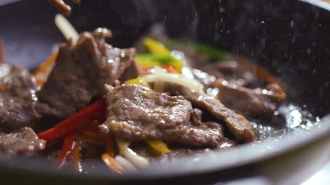 Chef is preparing a Korean dish Pulcogi, meat in Korean. Stock Footage 121745023