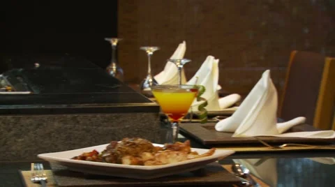Chef preparing a meal and meals set on table Stock Footage 60691073