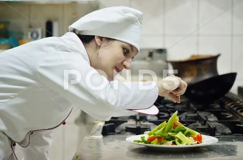 Chef preparing meal Stock Photos