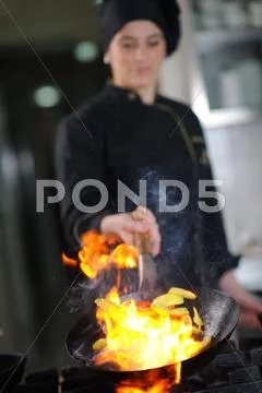 Chef preparing meal Stock Photos