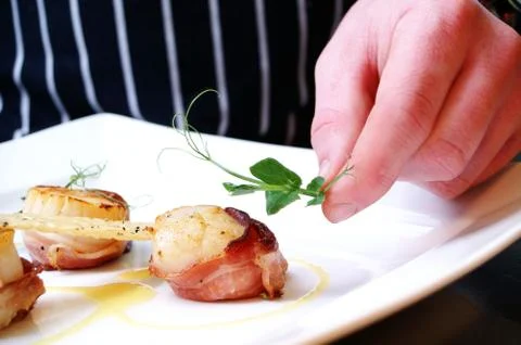 Chef preparing meal Stock Photos