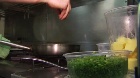Chef preparing meal in restaurant kitchen Stock Footage 54592268
