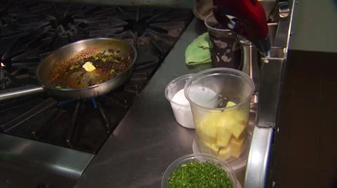 Chef preparing meal in restaurant kitchen Stock Footage 54592270