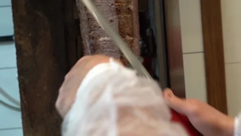 Chef is preparing meat doner. Stock Footage 150093898