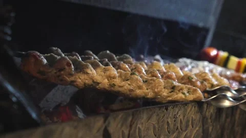 The chef is preparing a meat kebab. Stock Footage 131208264