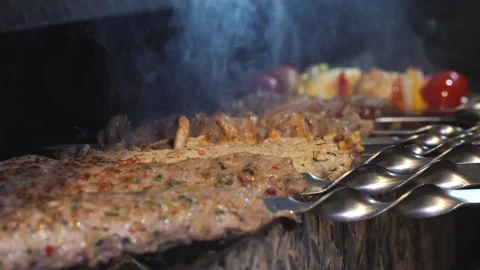 The chef is preparing a meat kebab. Stock Footage 132310812