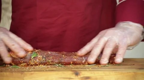 Chef preparing meat, sprinkle with seasoning Stock Footage 48168759