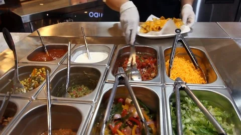Chef preparing Nacho for customer Video stock 75795595
