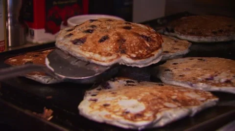 Chef preparing pancakes in pan Stock Footage 54593581