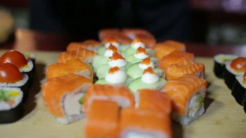 Chef preparing philadelphia sushi  set Video stock 70407255
