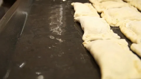 Chef preparing pies. Cooking process. Traditional food. Minced meat. Baking Stock Footage 99391618