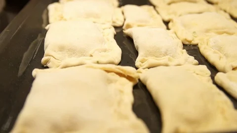 Chef preparing pies. Cooking process. Traditional food. Minced meat. Baking Stock Footage 99740812