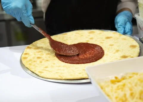Chef preparing pizza, Chef process of making pizza in pizza restaurant Stock Photos